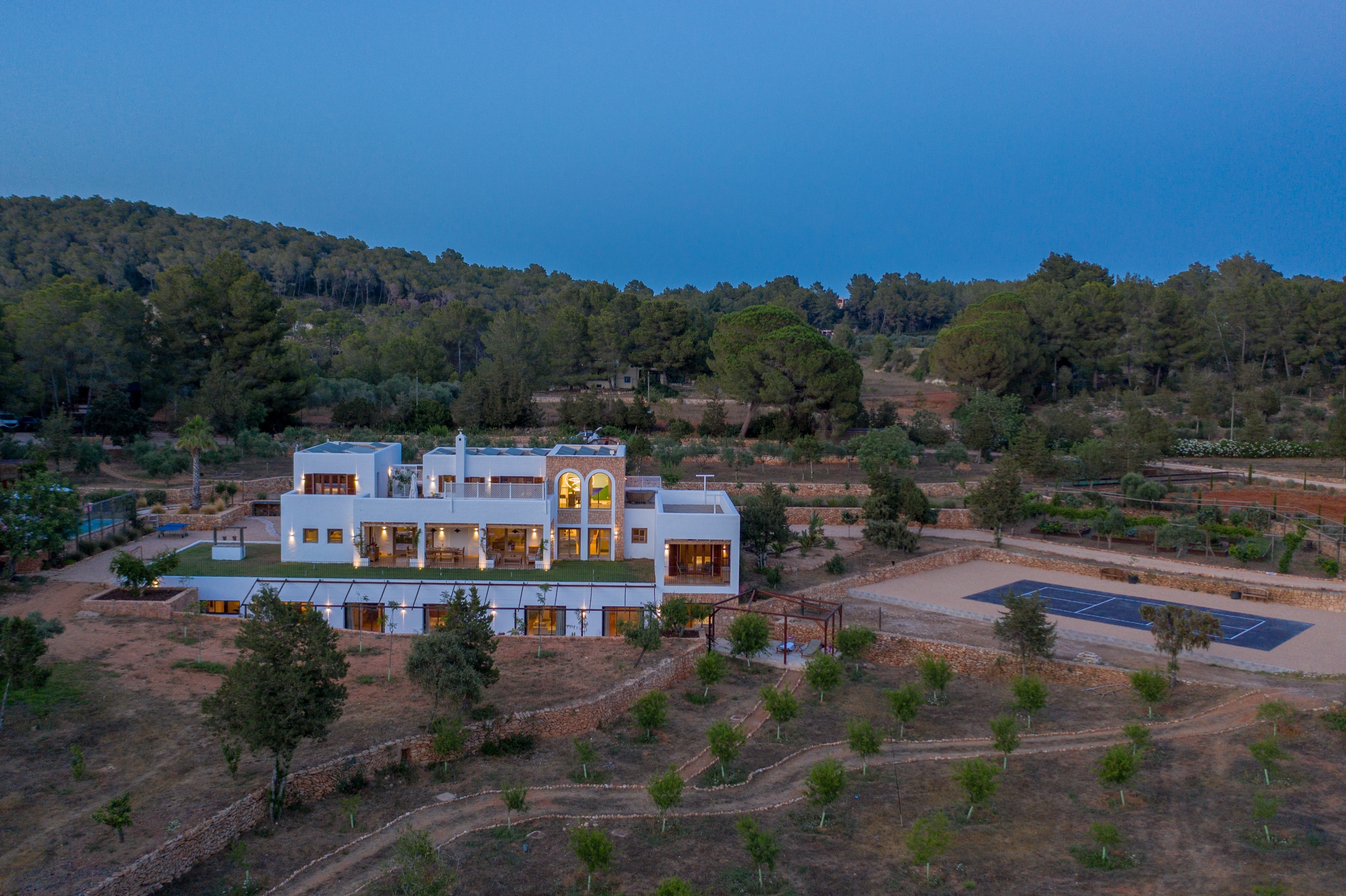 The Ibiza estate at blue hour,seen from the approach